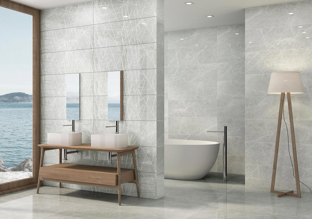 Modern bathroom with marble tiles, wooden vanity, and bathtub.